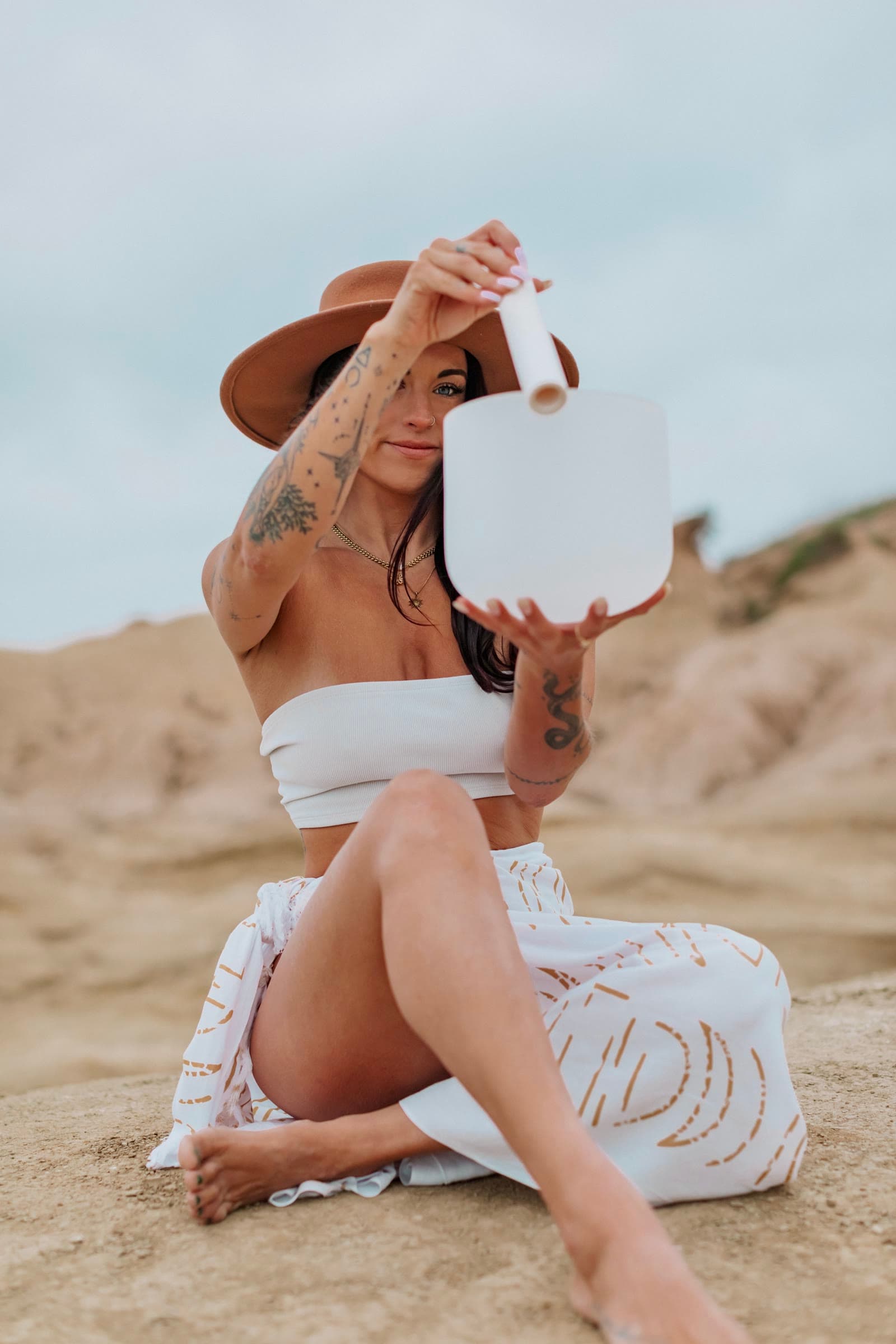 Kaitlyn offering sound healing in the desert